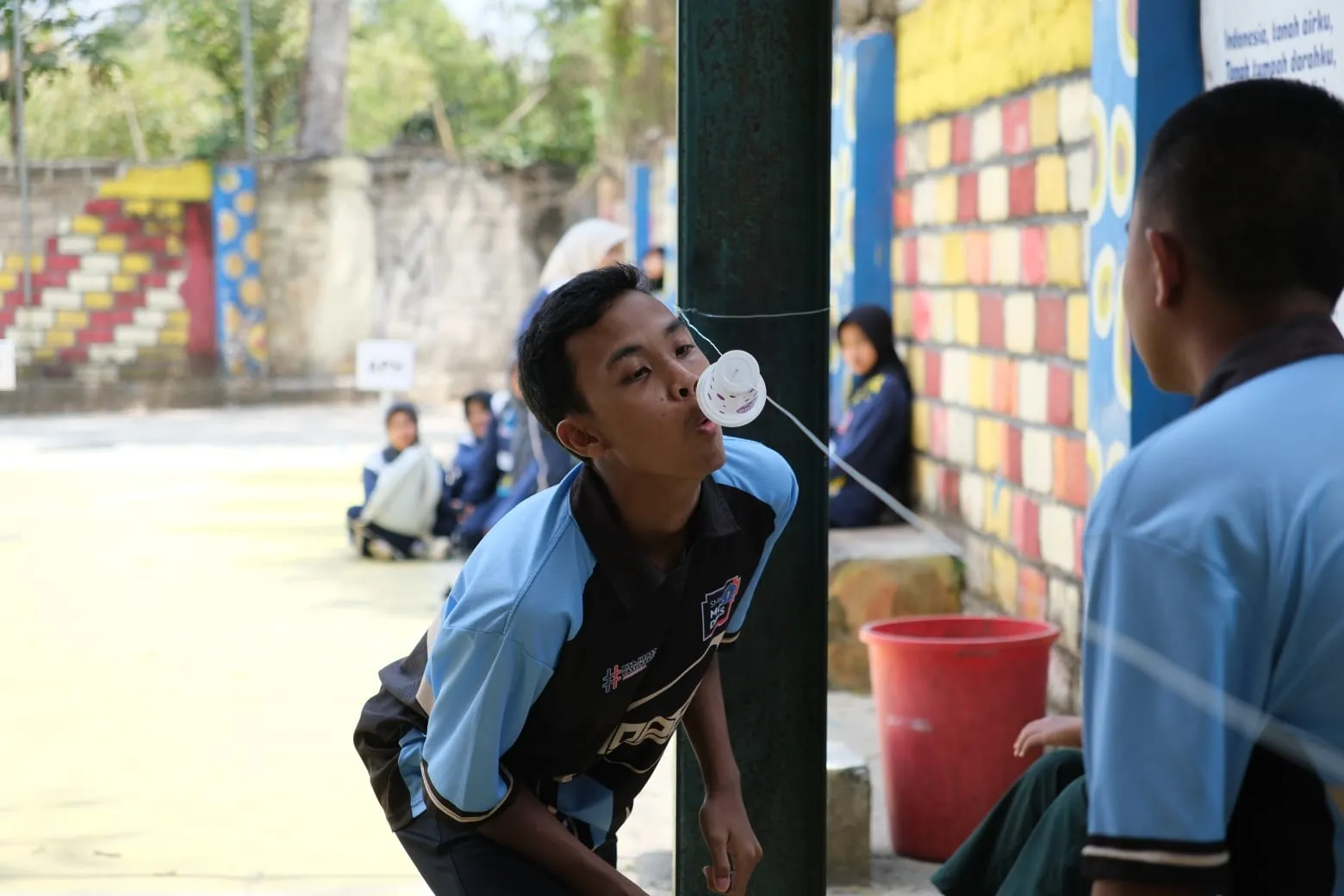 Semarak Kemerdekaan, SMK Models Gelar Lomba Estafet Meniup Gelas